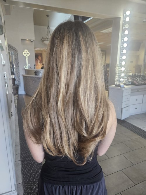 A woman after Addi gave her a balayage.